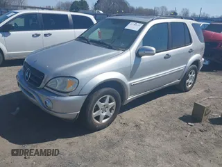 2003 Mercedes-Benz M-Class 3.2L with VIN 4JGAB54E23A383144, listed as a IAAI auction lot 41782124 with 148,084 mi miles. Bid and sale history available at carsss.com. Image 2.