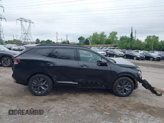 2023 Kia Sportage SX-Prestige with VIN KNDPXCAG3P7077955, listed as a IAAI auction lot 42456463 with 24,699 mi miles and . Bid and sale history available at DreamBid. Image 16.