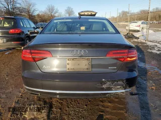 2015 Audi A8 z VIN WAUJGAFD4FN028750, wystawiony jako Copart lot #89099265 z przebiegiem 44 149 mil mil oraz Szkoda całkowita • Salvage title. Historia ofert i sprzedaży dostępna na DreamBid. Obrazek 6.