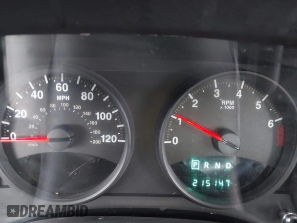 2011 Jeep Patriot Latitude with VIN 1J4NT1GB5BD245263, listed as a IAAI auction lot 41942376 with 215,147 mi miles. Bid and sale history available at carsss.com. Image 7.