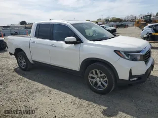 2021 Honda Ridgeline RTL-E with VIN 5FPYK3F7XMB019687, listed as a Copart auction lot 48424165 with 35,139 mi miles and Salvage Title. Bid and sale history available at carsss.com. Image 4.