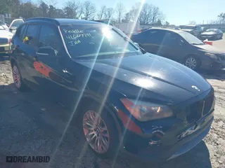 2013 BMW X1 28i with VIN WBAVM1C51DVW41977, listed as a IAAI auction lot 41607741 with 158,258 mi miles. Bid and sale history available at carsss.com. Image 1.