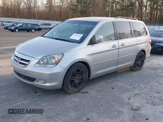 2006 Honda Odyssey Touring z VIN 5FNRL38856B098897, wystawiony jako IAAI lot #41251740 z przebiegiem 258 408 mil mil oraz . Historia ofert i sprzedaży dostępna na DreamBid. Obrazek 2.