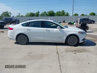 2018 Ford Fusion Titanium with VIN 3FA6P0RU3JR124007, listed as a IAAI auction lot 42207863 with 179,708 mi miles and . Bid and sale history available at DreamBid. Image 13.