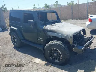 2007 Jeep Wrangler Sahara z VIN 1J4FA54147L184109, wystawiony jako IAAI lot #42183722 z przebiegiem Nie podano mil oraz . Historia ofert i sprzedaży dostępna na DreamBid. Obrazek 1.