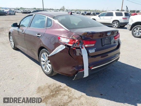 2017 Kia Optima LX with VIN 5XXGT4L33HG129749, listed as a IAAI auction lot 40360996 with 174,803 mi miles. Bid and sale history available at carsss.com. Image 3.