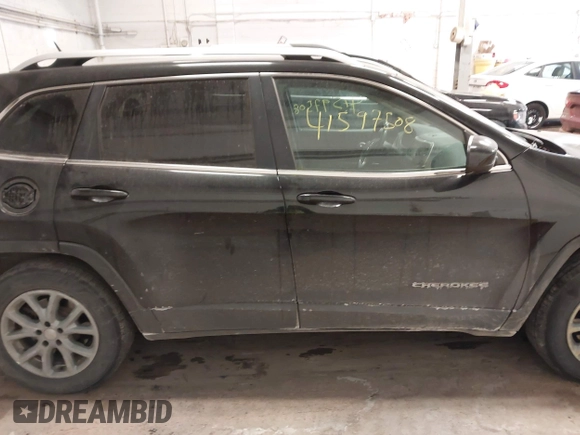 2014 Jeep Cherokee Latitude z VIN 1C4PJMCS0EW321380, wystawiony jako IAAI lot #41597508 z przebiegiem 173 991 mil mil oraz . Historia ofert i sprzedaży dostępna na DreamBid. Obrazek 13.