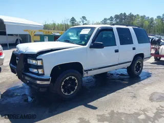 1997 Chevrolet Tahoe with VIN 1GNEK13R8VJ338626, listed as a IAAI auction lot 41976126 with 163,263 mi miles. Bid and sale history available at carsss.com. Image 17.