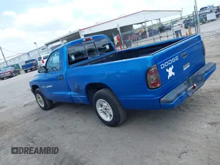 2000 Dodge Dakota z VIN 1B7FL26X1YS799143, wystawiony jako IAAI lot #42303206 z przebiegiem 148 576 mil mil oraz . Historia ofert i sprzedaży dostępna na DreamBid. Obrazek 14.