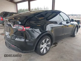 2023 Tesla Model Y Long Range with VIN 7SAYGDEE4PF789102, listed as a IAAI auction lot 41788860 with 88,457 mi miles and . Bid and sale history available at DreamBid. Image 4.