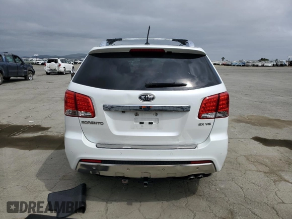 2012 Kia Sorento SX z VIN 5XYKWDA25CG280219, wystawiony jako Copart lot #54397025 z przebiegiem 197 685 mil mil oraz Szkoda całkowita • Salvage title. Historia ofert i sprzedaży dostępna na DreamBid. Obrazek 6.