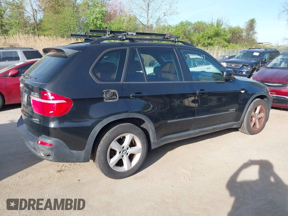 2010 BMW X5 35d with VIN 5UXFF0C52ALJ99499, listed as a IAAI auction lot 42109157 with 126,797 mi miles. Bid and sale history available at carsss.com. Image 4.