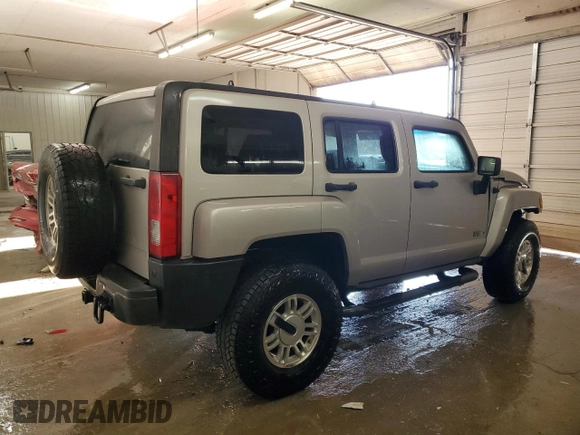 2006 Hummer H3 with VIN 5GTDN136568173279, listed as a Copart auction lot 86088854 with 142,813 mi miles and Salvage Title. Bid and sale history available at DreamBid. Image 3.