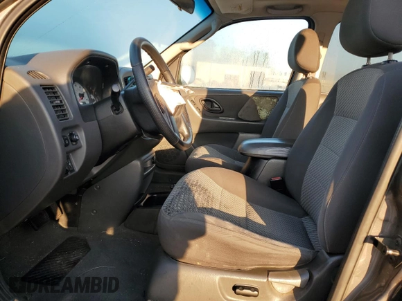 2004 Ford Escape XLT with VIN 1FMYU03154DA18466, listed as a Copart auction lot 70574604 with 168,553 mi miles and Salvage Title. Bid and sale history available at carsss.com. Image 7.
