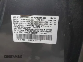 2012 Honda Pilot EX-L with VIN 5FNYF4H53CB026381, listed as a IAAI auction lot 41802360 with 165,425 mi miles and . Bid and sale history available at DreamBid. Image 9.