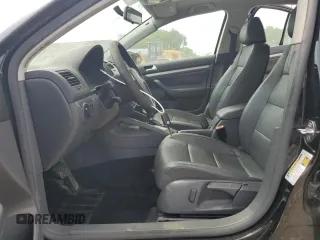 2007 Volkswagen Jetta Wolfsburg Edition z VIN 3VWEF71K77M087560, wystawiony jako Copart lot #60809985 z przebiegiem 151 561 mil mil oraz Szkoda całkowita • Salvage title. Historia ofert i sprzedaży dostępna na DreamBid. Obrazek 7.