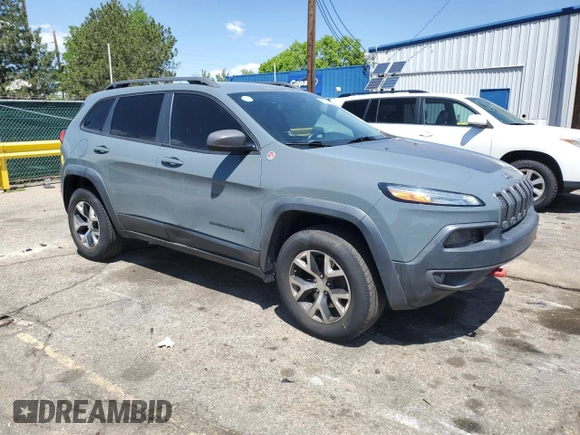 2014 Jeep Cherokee Trailhawk z VIN 1C4PJMBBXEW134939, wystawiony jako Copart lot #56579125 z przebiegiem 155 693 mil mil oraz Czysty tytuł • Clean title. Historia ofert i sprzedaży dostępna na DreamBid. Obrazek 4.