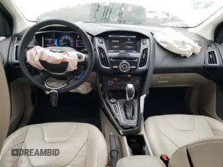 2015 Ford Focus Electric z VIN 1FADP3R41FL232835, wystawiony jako Copart lot #70969312 z przebiegiem 39 606 mil mil oraz . Historia ofert i sprzedaży dostępna na DreamBid. Obrazek 8.