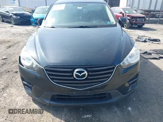 2016 Mazda CX-5 Sport with VIN JM3KE4BY3G0843177, listed as a IAAI auction lot 41804094 with 193,461 mi miles. Bid and sale history available at carsss.com. Image 12.