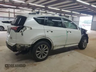 2016 Toyota RAV4 Limited with VIN JTMDJREV9GD014991, listed as a Copart auction lot 61238115 with Not provided miles and Salvage title. Bid and sale history available at DreamBid. Image 3.