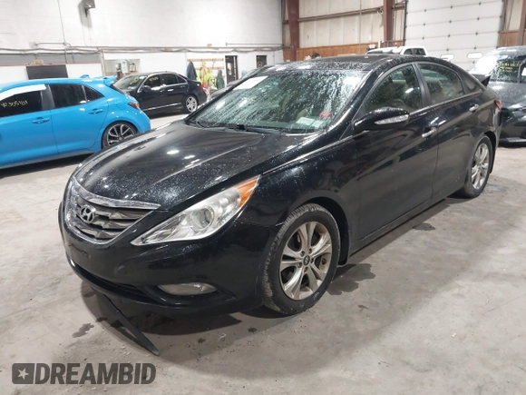 2012 Hyundai Sonata SE z VIN 5NPEC4AC9CH355351, wystawiony jako IAAI lot #42318588 z przebiegiem 122 864 mil mil oraz . Historia ofert i sprzedaży dostępna na DreamBid. Obrazek 2.
