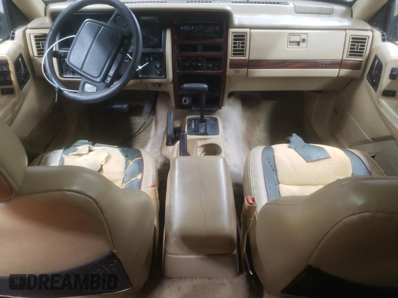 1995 Jeep Grand Cherokee Limited z VIN 1J4GZ78S7SC766726, wystawiony jako Copart lot #84909134 z przebiegiem 174 256 mil mil oraz Szkoda całkowita • Salvage title. Historia ofert i sprzedaży dostępna na DreamBid. Obrazek 8.