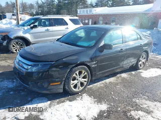 2012 Ford Fusion SE z VIN 3FAHP0HA1CR120251, wystawiony jako IAAI lot #41411959 z przebiegiem 180 009 mil mil oraz . Historia ofert i sprzedaży dostępna na DreamBid. Obrazek 2.