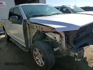 2015 Ford F-150 XL with VIN 1FTEX1C88FFC26544, listed as a Copart auction lot 48242705 with 124,731 mi miles and Salvage Title. Bid and sale history available at carsss.com. Image 14.