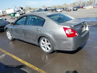 2005 Nissan Maxima 3.5 SL with VIN 1N4BA41E15C832028, listed as a IAAI auction lot 42008272 with 201,978 mi miles. Bid and sale history available at carsss.com. Image 3.