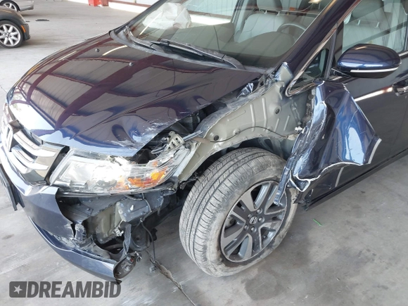 2017 Honda Odyssey Touring with VIN 5FNRL5H90HB017215, listed as a IAAI auction lot 42574528 with 61,386 mi miles and . Bid and sale history available at DreamBid. Image 6.