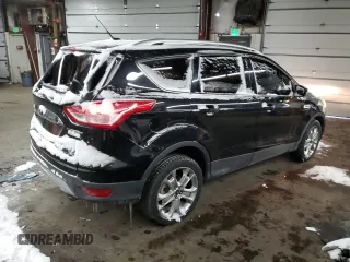 2015 Ford Escape Titanium with VIN 1FMCU0J91FUA41653, listed as a Copart auction lot 88871205 with 128,971 mi miles and Salvage Title. Bid and sale history available at DreamBid. Image 3.