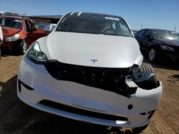 2024 Tesla Model Y Performance with VIN 7SAYGDEF6RA284171, listed as a Copart auction lot 50317205 with 6,870 mi miles and Salvage Title. Bid and sale history available at DreamBid. Image 5.