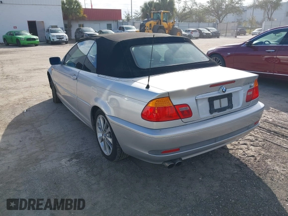 2004 BMW 3 Series 330Ci with VIN WBABW534X4PL45274, listed as a IAAI auction lot 41437124 with 124,001 mi miles. Bid and sale history available at carsss.com. Image 3.