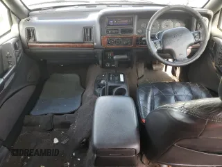 1996 Jeep Grand Cherokee Limited with VIN 1J4GZ78S2TY123592, listed as a Copart auction lot 84387624 with Not Provided miles and Salvage Title. Bid and sale history available at carsss.com. Image 8.
