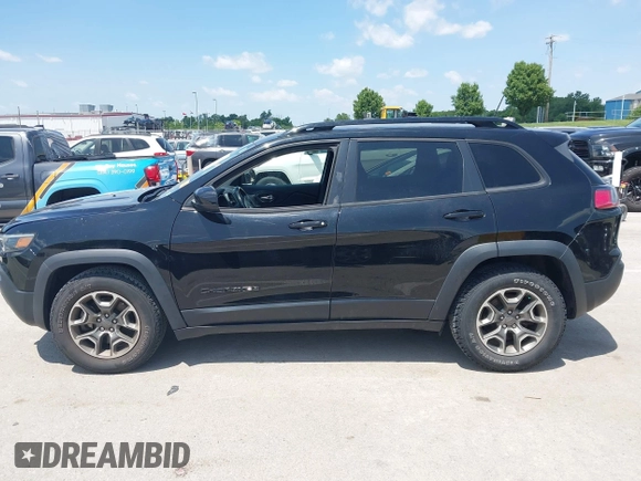 2020 Jeep Cherokee Latitude z VIN 1C4PJMCX3LD584466, wystawiony jako IAAI lot #42380627 z przebiegiem 53 062 mil mil oraz . Historia ofert i sprzedaży dostępna na DreamBid. Obrazek 14.