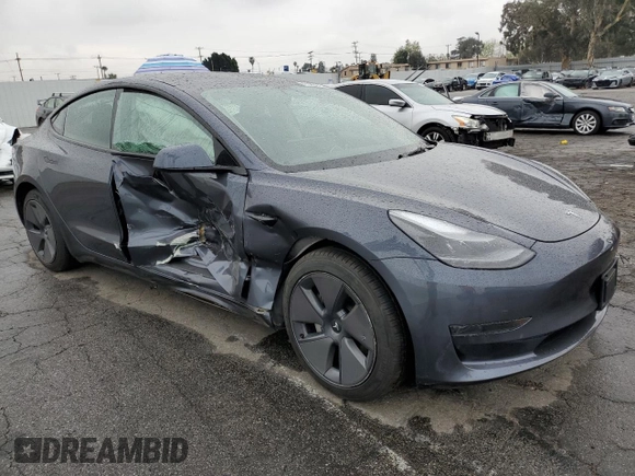 2023 Tesla Model 3 with VIN 5YJ3E1EA2PF708297, listed as a Copart auction lot 47982675 with 16,246 mi miles and Salvage title. Bid and sale history available at DreamBid. Image 4.