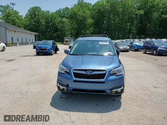 2017 Subaru Forester Touring z VIN JF2SJAWC9HH564242, wystawiony jako Copart lot #59209265 z przebiegiem Nie podano mil oraz Szkoda całkowita • Salvage title. Historia ofert i sprzedaży dostępna na DreamBid. Obrazek 15.