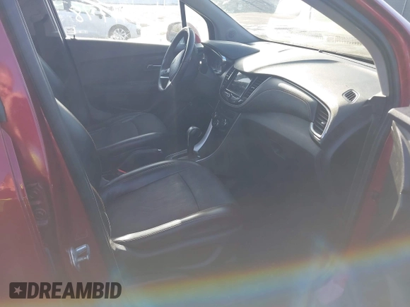 2018 Chevrolet Trax LT with VIN 3GNCJLSB5JL307086, listed as a IAAI auction lot 41941778 with 109,985 mi miles and . Bid and sale history available at carsss.com. Image 5.