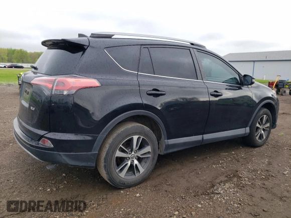 2018 Toyota RAV4 XLE with VIN 2T3WFREV0JW484430, listed as a Copart auction lot 55878455 with 132,335 mi miles and Salvage title. Bid and sale history available at DreamBid. Image 3.