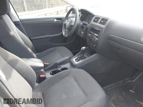 2014 Volkswagen Jetta S with VIN 3VW2K7AJ7EM313535, listed as a IAAI auction lot 41786112 with 63,694 mi miles and . Bid and sale history available at DreamBid. Image 5.