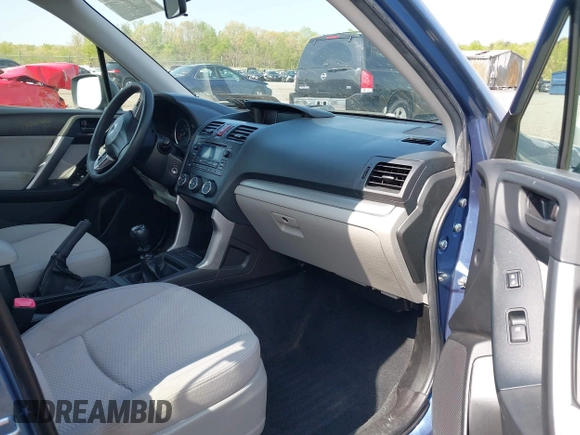2015 Subaru Forester 2.5i with VIN JF2SJAAC0FG505980, listed as a IAAI auction lot 42010748 with 129,584 mi miles. Bid and sale history available at carsss.com. Image 5.
