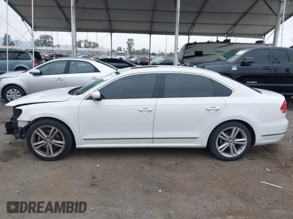 2015 Volkswagen Passat 1.8T SE w/Sunroof & Nav with VIN 1VWBT7A31FC043798, listed as a IAAI auction lot 42108289 with 132,442 mi miles. Bid and sale history available at carsss.com. Image 15.