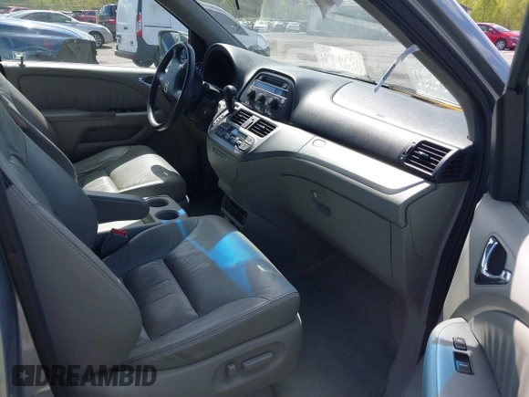 2010 Honda Odyssey EX-L with VIN 5FNRL3H74AB046578, listed as a IAAI auction lot 42049213 with 218,457 mi miles. Bid and sale history available at carsss.com. Image 5.