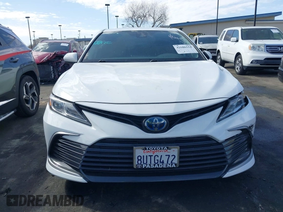 2021 Toyota Camry Hybrid LE with VIN 4T1C31AK4MU549057, listed as a IAAI auction lot 41686552 with 43,051 mi miles. Bid and sale history available at carsss.com. Image 13.