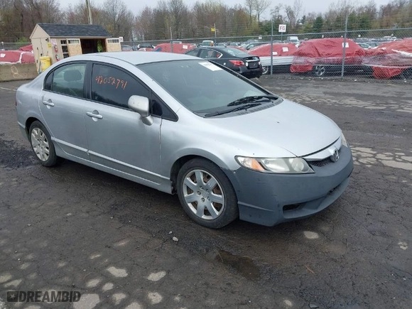 2009 Honda Civic Sdn LX with VIN 2HGFA16559H313538, listed as a IAAI auction lot 42052791 with 136,594 mi miles. Bid and sale history available at carsss.com. Image 1.