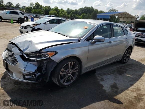 2020 Ford Fusion Titanium with VIN 3FA6P0D97LR138594, listed as a Copart auction lot 57755565 with Not provided miles and Clean title. Bid and sale history available at DreamBid. Image 1.