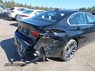 2019 BMW 3 Series 330i xDrive with VIN WBA5R7C59KFH30971, listed as a IAAI auction lot 42005244 with 59,514 mi miles and . Bid and sale history available at DreamBid. Image 6.