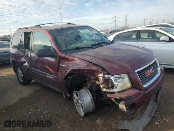 2004 GMC Envoy SLE with VIN 1GKDT13S342304711, listed as a Copart auction lot 44695385 with 129,804 mi miles and Salvage Title. Bid and sale history available at carsss.com. Image 4.