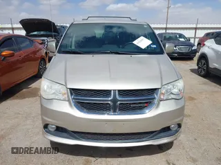 2014 Dodge Grand Caravan SXT with VIN 2C4RDGCG6ER466459, listed as a IAAI auction lot 41820907 with 105,404 mi miles and . Bid and sale history available at DreamBid. Image 11.