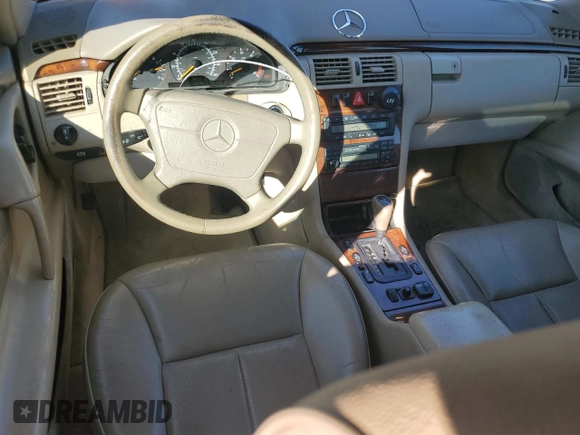 1998 Mercedes-Benz E 320 with VIN WDBJF25F3WA578364, listed as a Copart auction lot 77551834 with 228,913 mi miles and Salvage Title. Bid and sale history available at DreamBid. Image 8.